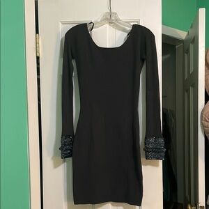 Elegant Black Dress with Beaded Cuffs